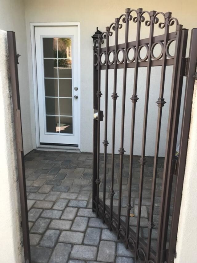 Iron gate & pavers - 28 Aprilla