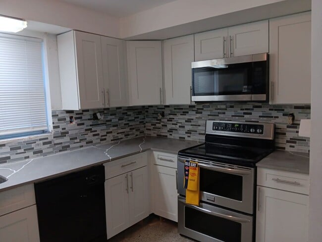 Building Photo - Renovated 3BR/2BA Corner Single-Family Home – Large Fenced Yard, NO HOA