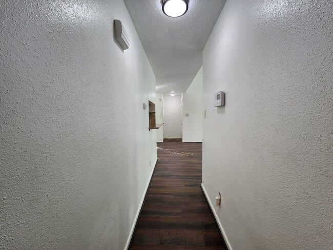 Building Photo - Stylish 2BR, 2BA Townhome with Modern Flai...
