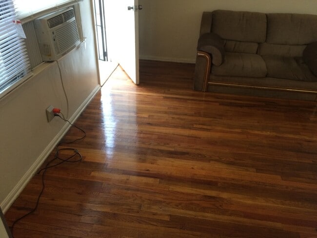Living area with genuine hard wood floors - 5646 Farmdale Ave