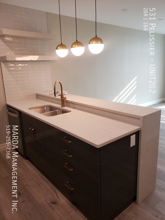 Building Photo - The Hive on Pelissier