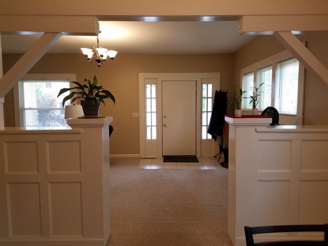 Living Room flows into Dining Area - 103 W 12th St