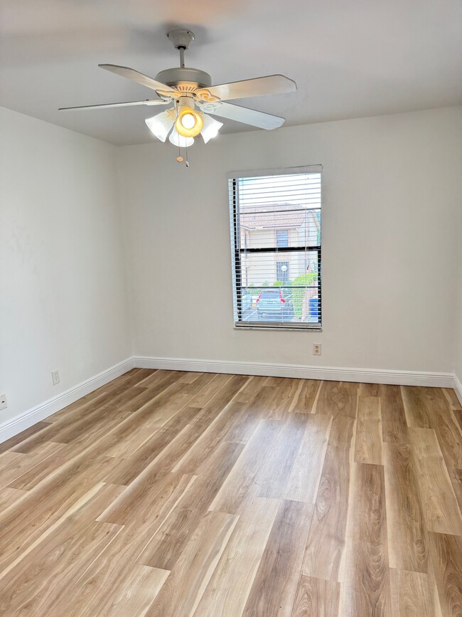 Primary Bedroom Two Windows - 9480 Boca Cove Cir