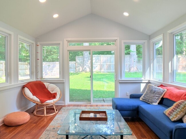 Building Photo - Large fenced in yard and Sun room!