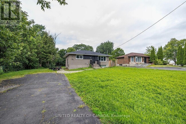 Photo du bâtiment - 66 Thickson Rd N