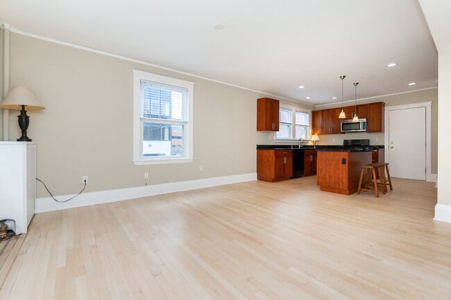 Photo - Renovated 3BR/2BA 1,278 SF In-Unit Laundry Parking Basement Storage Available Sept 1 Apartment