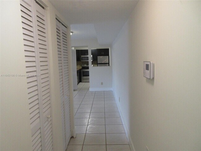 Building Photo - 10710 Royal Palm Blvd