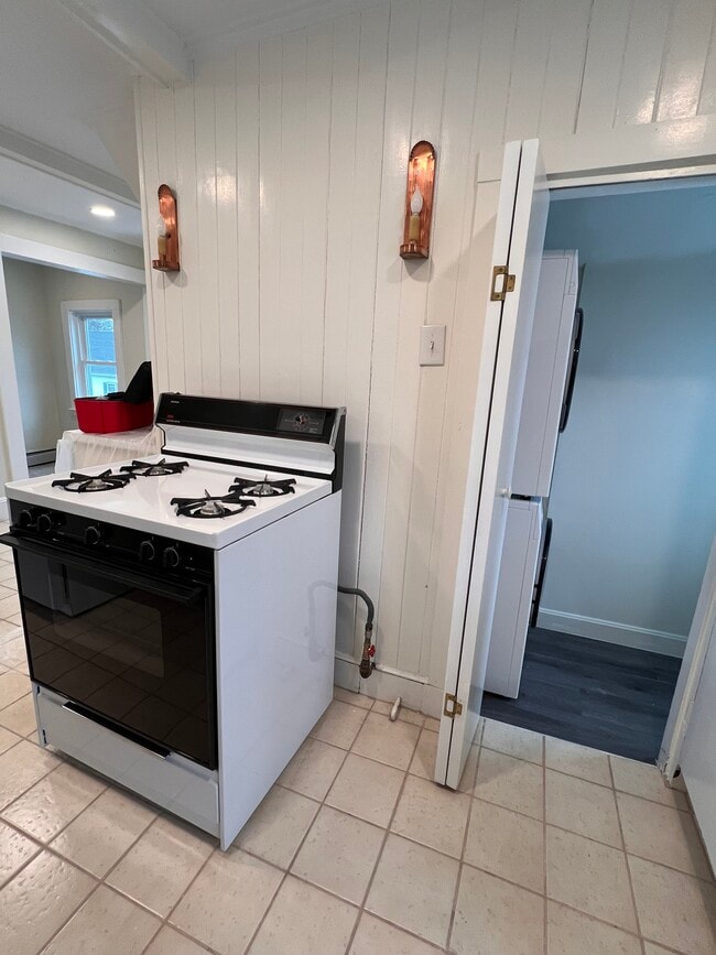 Gas stove, dishwasher being installed - 19 Irving St