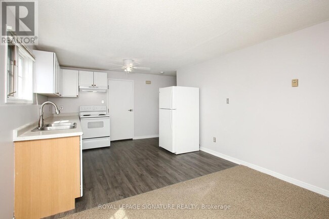 Building Photo - 42 Tecumseh Ave