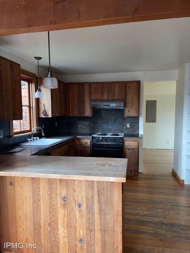 Foto del edificio - 3 br, 2 bath House - 1677 E. 25th Ave.