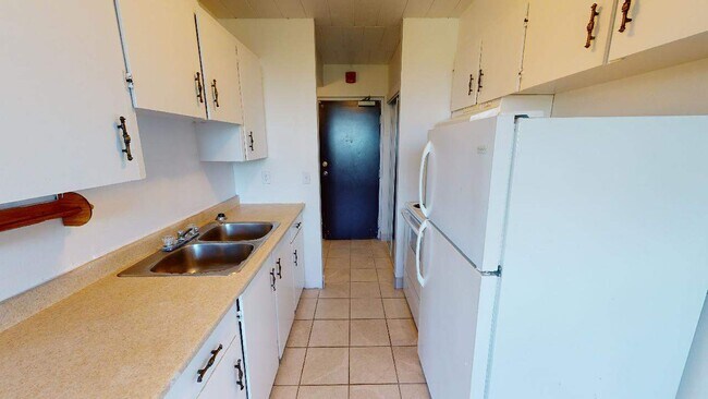 Photo du bâtiment - First Place Apartments