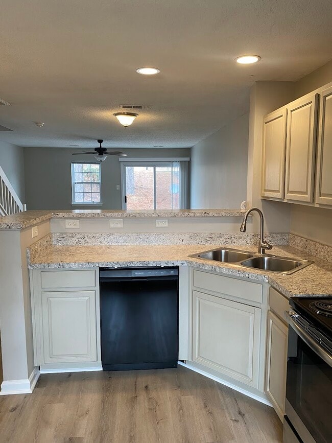 Kitchen overlooking family room - 160 Portestown Way
