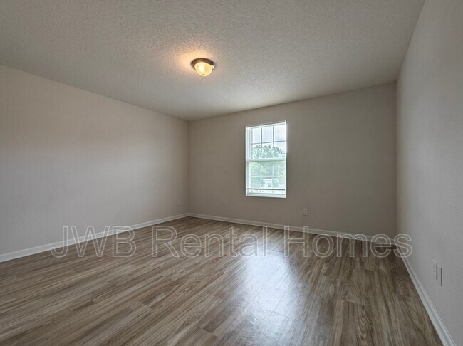 Building Photo - 8498 McGirts Village Ln