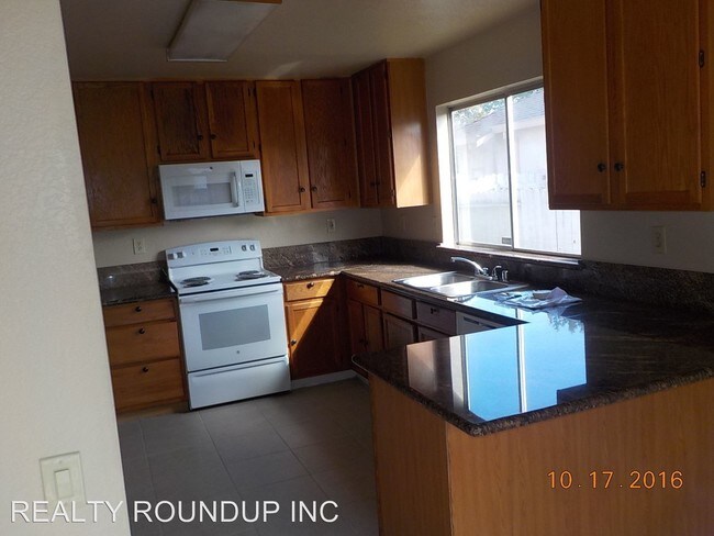 Foto del edificio - 3 br, 2 bath House - 5700 Rightwood Way