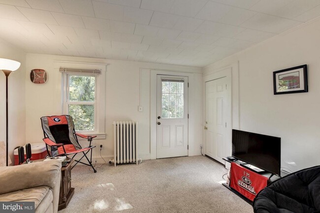 Living Room and Entry Door - 4308 Ridge Rd