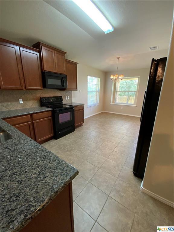 Building Photo - 5911 Hopkins Dr