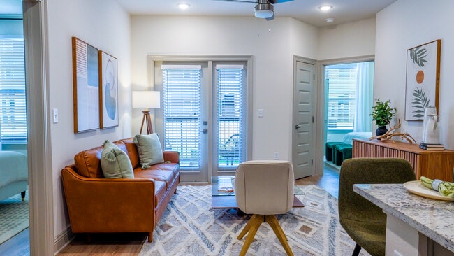 The Cedar: 2BR, 2BA -Living Room - The Waters at West Village