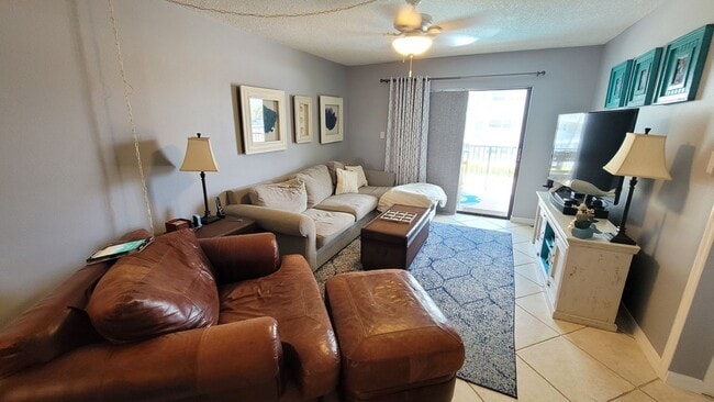Building Photo - Fully Furnished Condo in the heart of Coco...