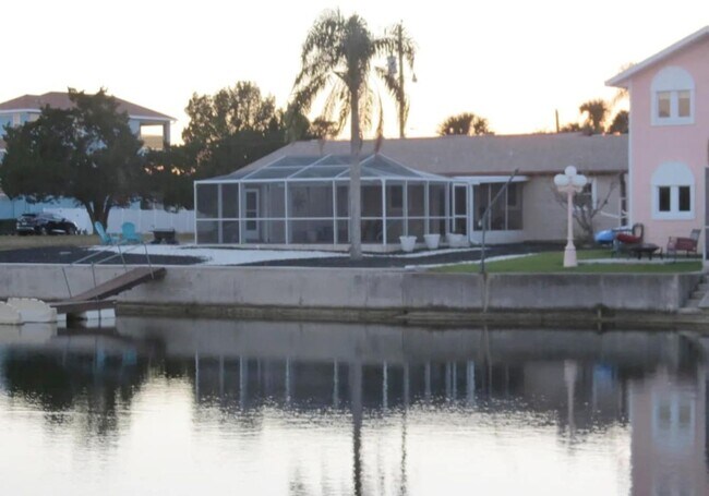 Building Photo - Waterfront 2BR/2BA Home w/ Pool, Dock & Ga...
