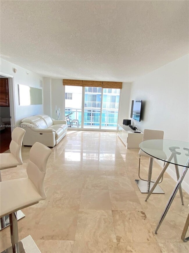 Building Photo - 6917 Collins Ave