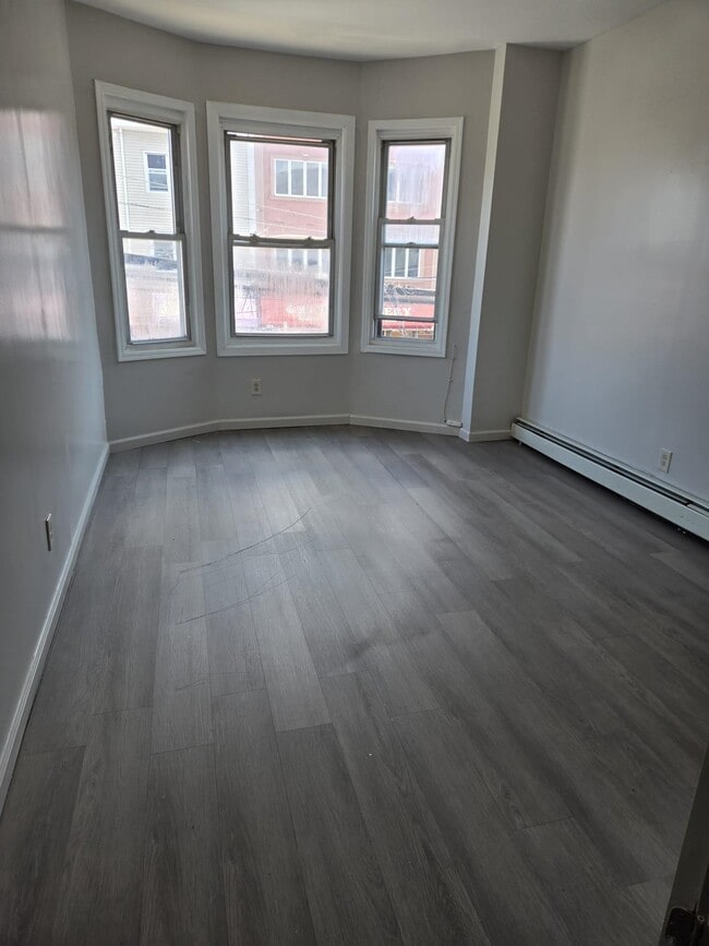 Building Photo - 325-329-329 Grand St
