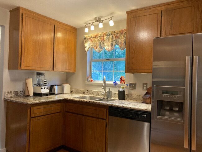 kitchen sink, w facing bk. yard - 14217 55th Ave SE