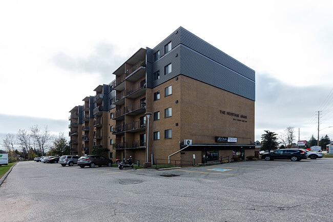 Building Photo - The Heritage Arms Apartments