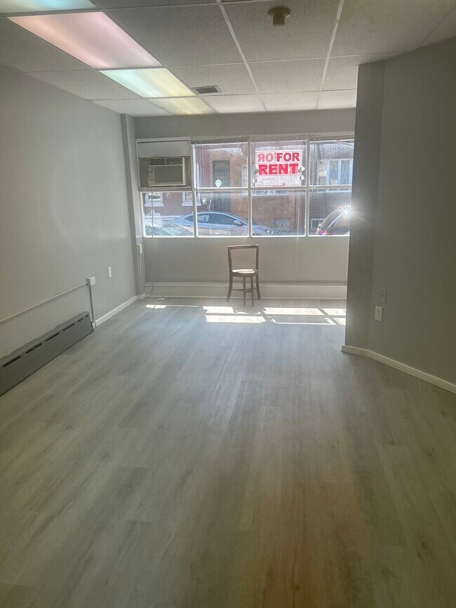 1st room when you enter - 1201 Moore St