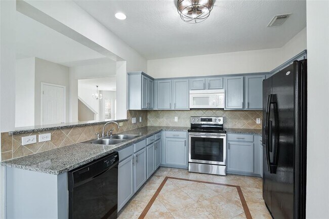Building Photo - 7554 Oakwood Canyon Dr