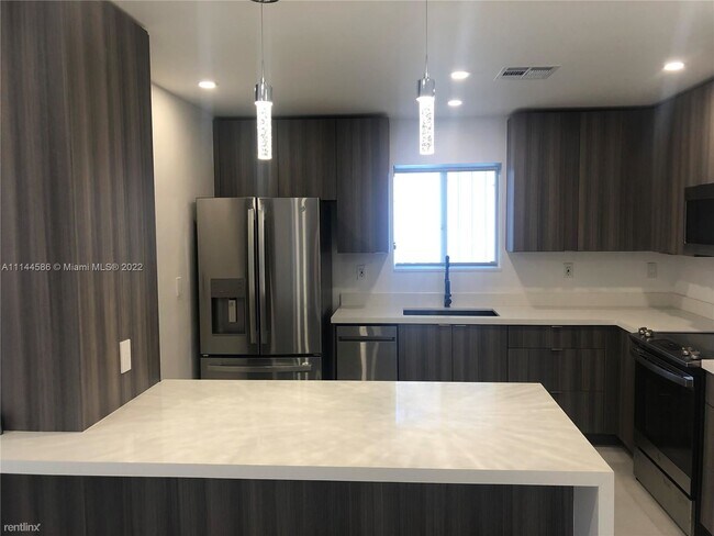 Foto del edificio - 3 br, 2 bath House - 5447 NW 4th Ave