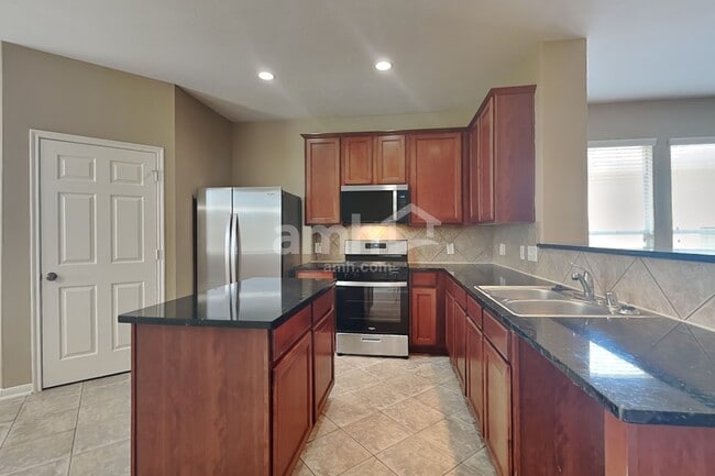 Building Photo - 7418 Jacobs Well Dr