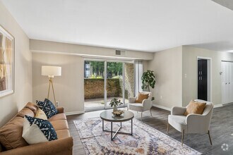 1BR, 1BA - 862SF - Living Room - Carriage Club Apartments