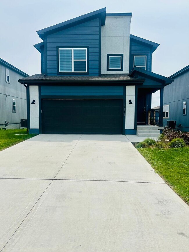 Building Photo - {13305} Less Than 2 Year Old 1.5 Story in ...
