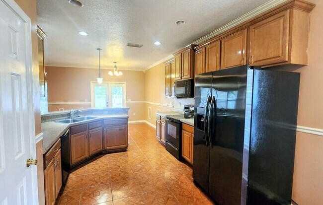 Foto del edificio - Spacious 4BR w/ Fenced Yard + Covered Lanai + 2 Car Garage  in Orange Park!