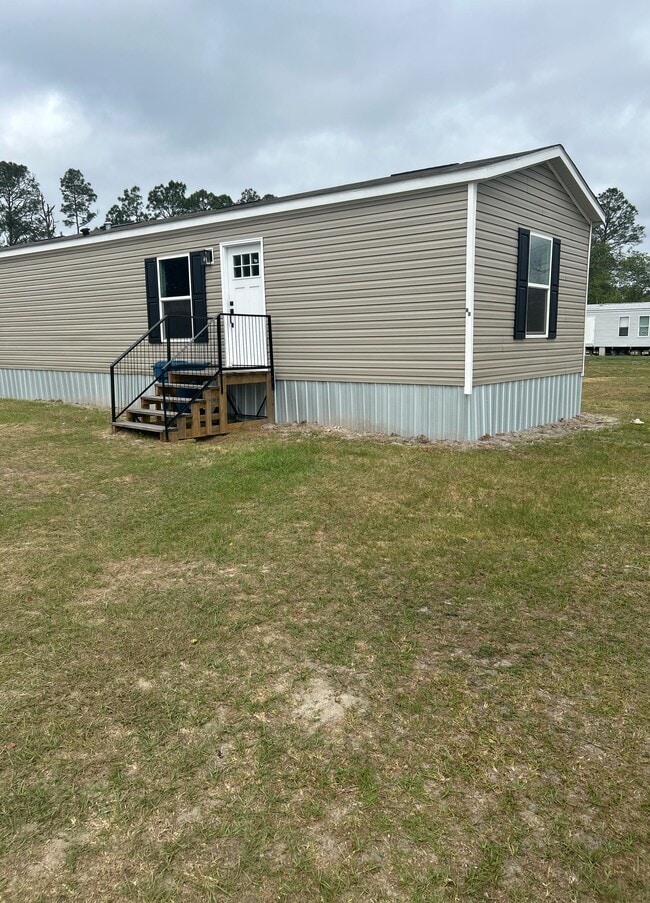 Building Photo - Earls Lot #2B