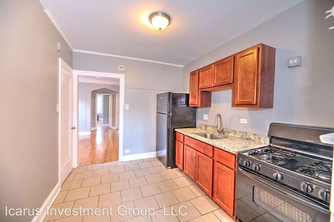 Foto del edificio - 7842-7846 S Oglesby Ave