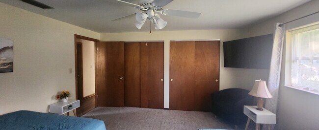 Plenty of closet space with a 50 inch, mounted Smart TV - 5914 Wilson Dr