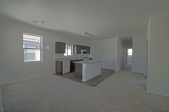 Building Photo - Newer Three Bedroom, Two Bath, Two Car Garage in Rio Rancho!!!!!!!