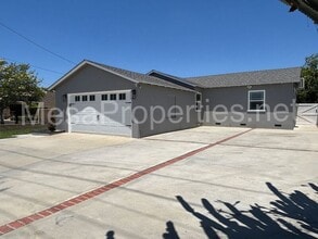 Building Photo - 6056 Walnut Ave