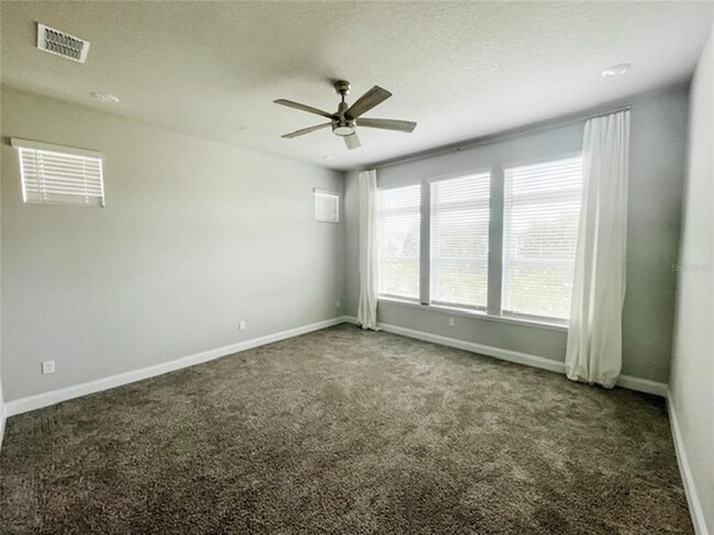 Building Photo - 8669 Tavistock Lakes Blvd