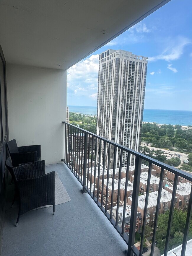 Spacious Balcony Facing East with North East and South East views - 1636 N Wells St