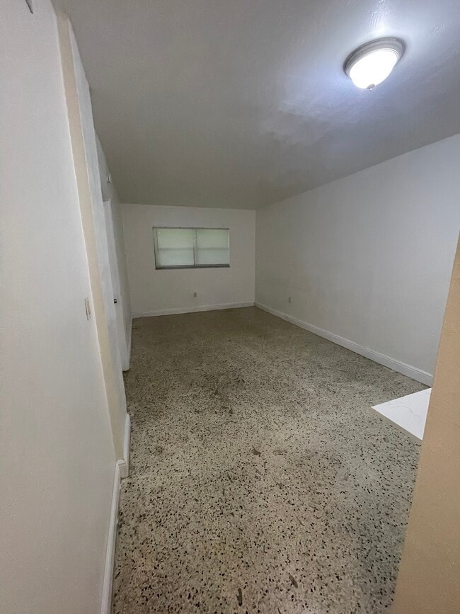 Living Room Closed Blinds - 665 NE 83rd Ter (Miami, FL) Apartment