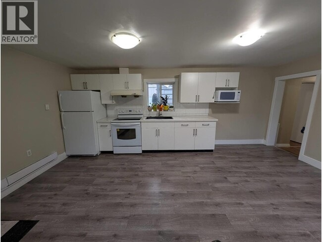 Building Photo - 1XXX E 64th Ave