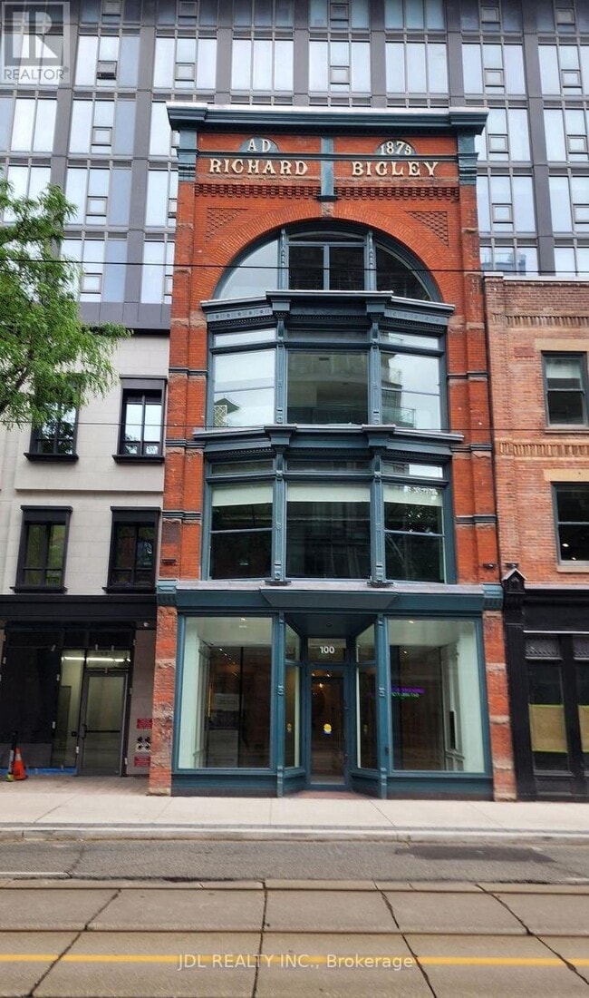 Building Photo - 100 Queen St E