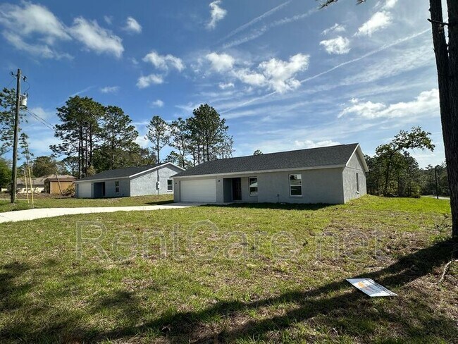 Building Photo - 7043 N Outrigger Terrace