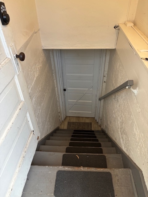 Stairs down to apt - 6356 Elm St