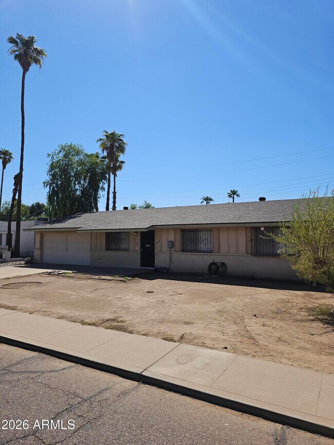 Building Photo - 6037 W Indian School Rd
