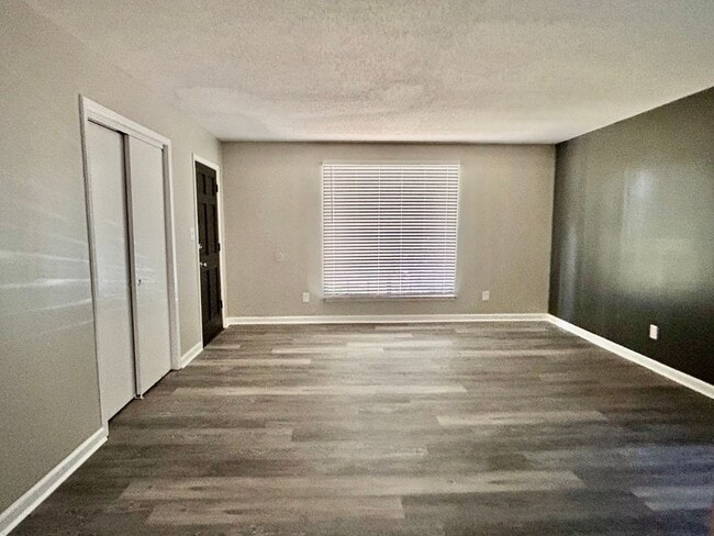 Building Photo - HALF OFF FIRST MONTHS RENT PROMOTION