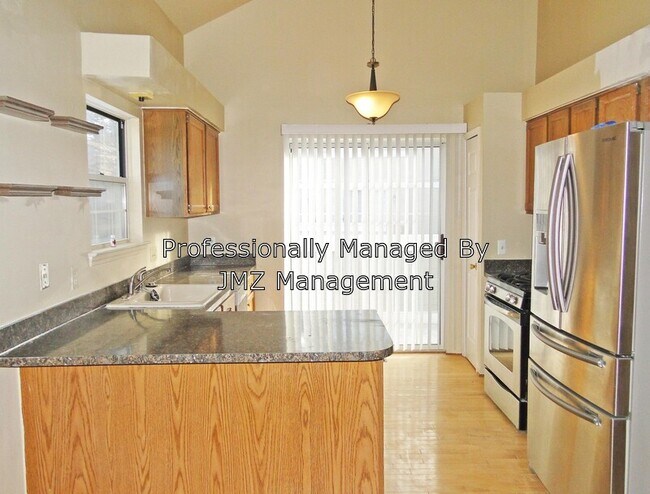 Building Photo - 6775 Stonehedge Ct