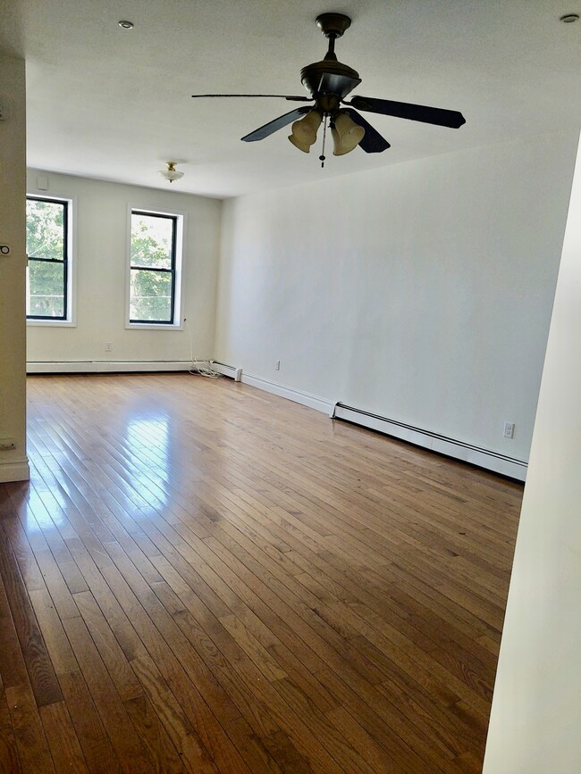 Newly Re-finished Hardwood Floors - 483 Elm St